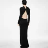 Asymmetrische avondjurk met lange mouwen en gedraaide rug Asymmetrische avondjurk met lange mouwen en gedraaide rug