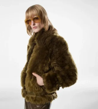Blouson van schapenvacht met lederen details