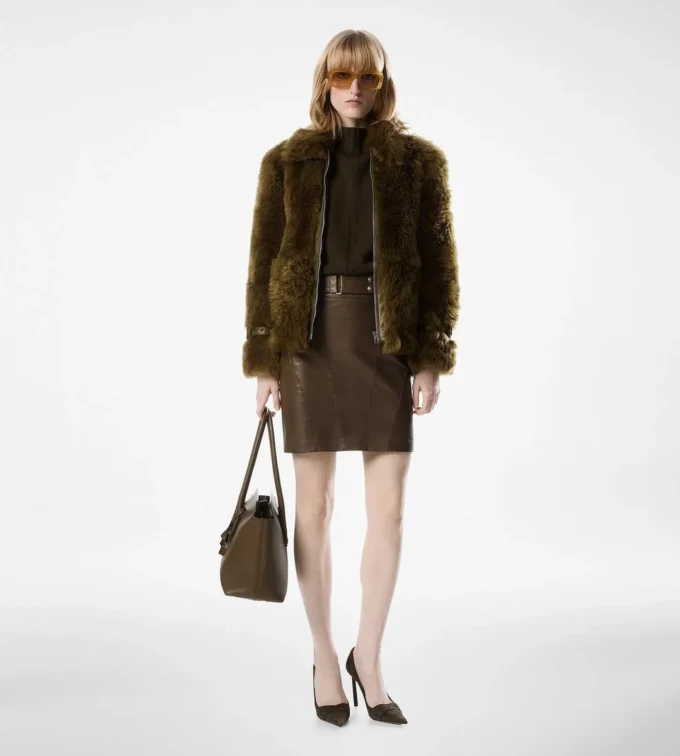 Blouson van schapenvacht met lederen details Blouson van schapenvacht met lederen details
