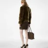 Blouson van schapenvacht met lederen details Blouson van schapenvacht met lederen details