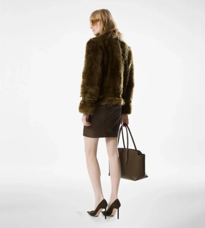 Blouson van schapenvacht met lederen details Blouson van schapenvacht met lederen details