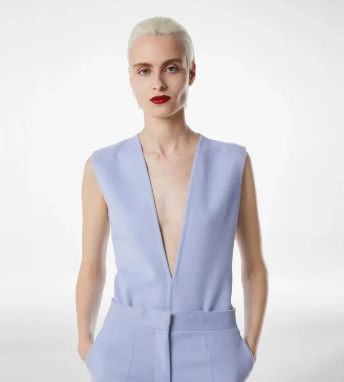 Dubbelzijdige bodysuit van lichte wol met V-hals Dubbelzijdige bodysuit van lichte wol met V-hals