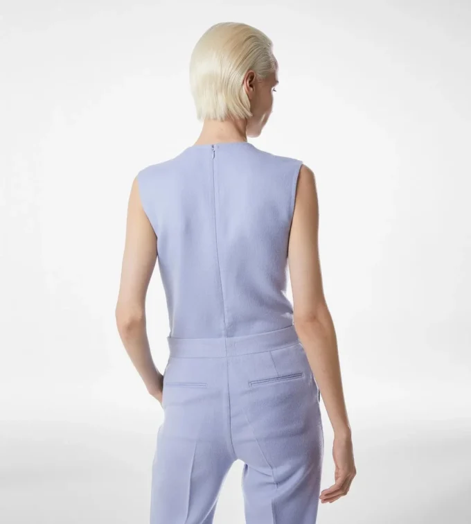 Dubbelzijdige bodysuit van lichte wol met V-hals Dubbelzijdige bodysuit van lichte wol met V-hals