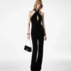 Halternek jumpsuit met gedraaide voorkant van fluweel Halternek jumpsuit met gedraaide voorkant van fluweel