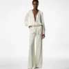 Jumpsuit met lange mouwen en plooien Jumpsuit met lange mouwen en plooien