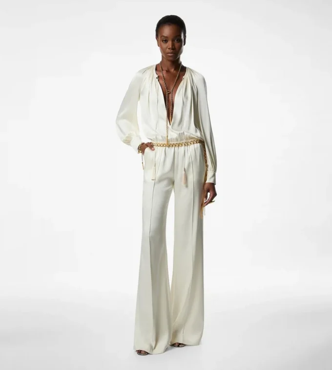 Jumpsuit met lange mouwen en plooien Jumpsuit met lange mouwen en plooien