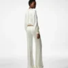 Jumpsuit met lange mouwen en plooien Jumpsuit met lange mouwen en plooien