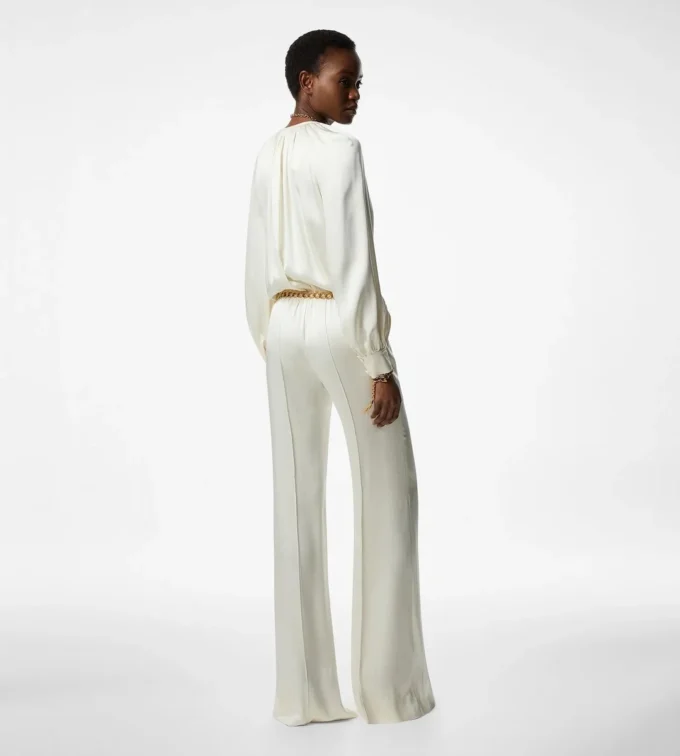 Jumpsuit met lange mouwen en plooien Jumpsuit met lange mouwen en plooien