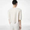 Merino kasjmier T-shirt met ronde hals en zijden chenille reliëf met pythonmotief Merino kasjmier T-shirt met ronde hals en zijden chenille reliëf met pythonmotief