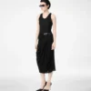 Tanktopjurk met lederen details Tanktopjurk met lederen details