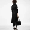 Trenchcoat met leren onderkraag Trenchcoat met leren onderkraag