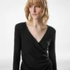 Wollen jumpsuit met lange mouwen en overslag