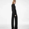 Wollen jumpsuit met lange mouwen en overslag